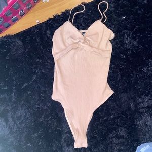 Tan body suit